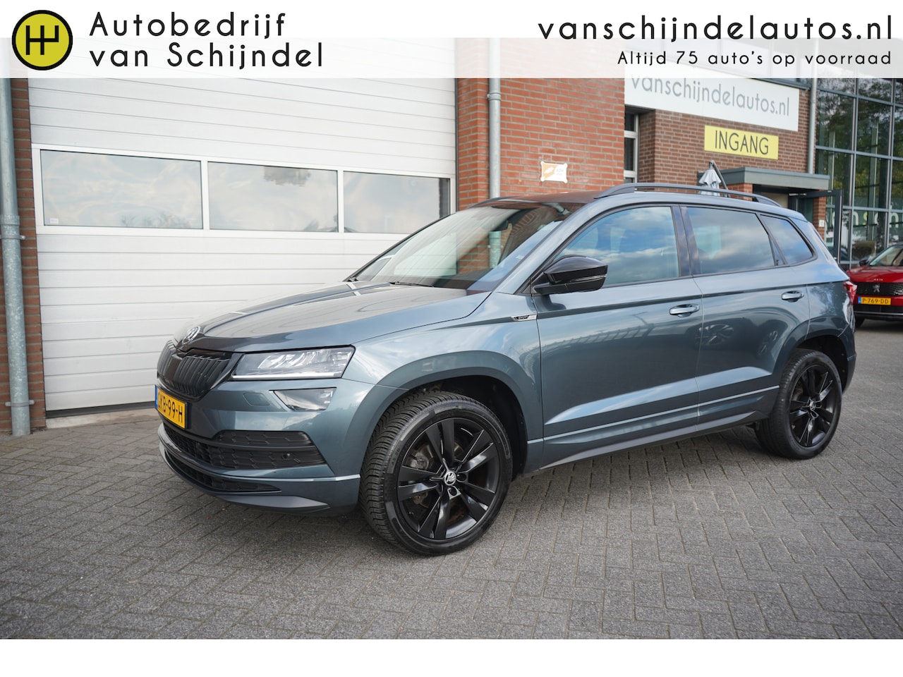 Skoda Karoq - 1.5 TSI ACT 150PK SPORTLINE BUSINESS VOL LUXE PANORAMADAK ZWARTE HEMEL CAMERA STOEL+STUURV - AutoWereld.nl