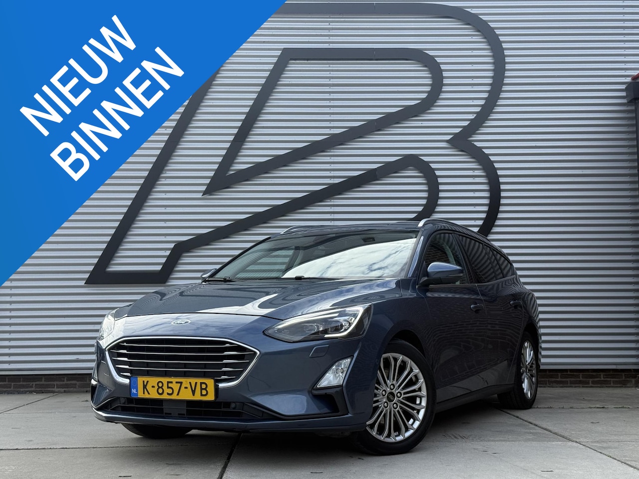 Ford Focus Wagon - 1.0 EcoBoost Titanium Business 2e Eigenaar|Navi|Camera|Clima|Cruise|Stoelverwarming|Carpla - AutoWereld.nl
