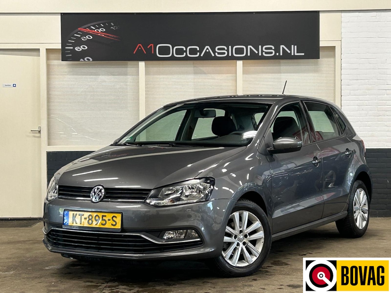 Volkswagen Polo - 1.2 TSI Comfortline + NAVI - AutoWereld.nl