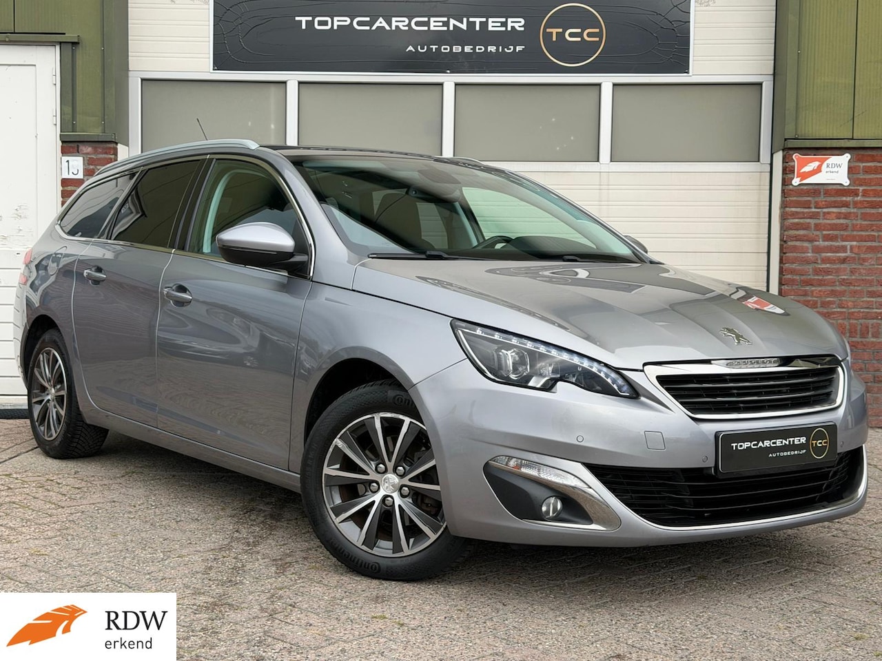 Peugeot 308 SW - 1.2 Allure/PANO/AUT/PARKS/NAVI/CRUISE/APK - AutoWereld.nl
