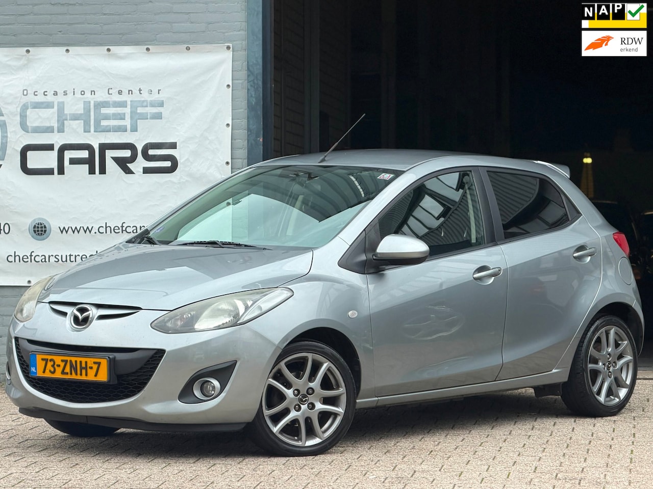 Mazda 2 - 1.3 GT|NAP|AIRCO|5DEURS|BOEKJES|STOELVW|LM|TREKHAAK! - AutoWereld.nl