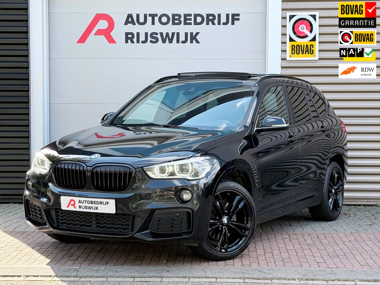 BMW X1 - SDrive20i High Executive Pano/H&K/HuD/Leer - AutoWereld.nl
