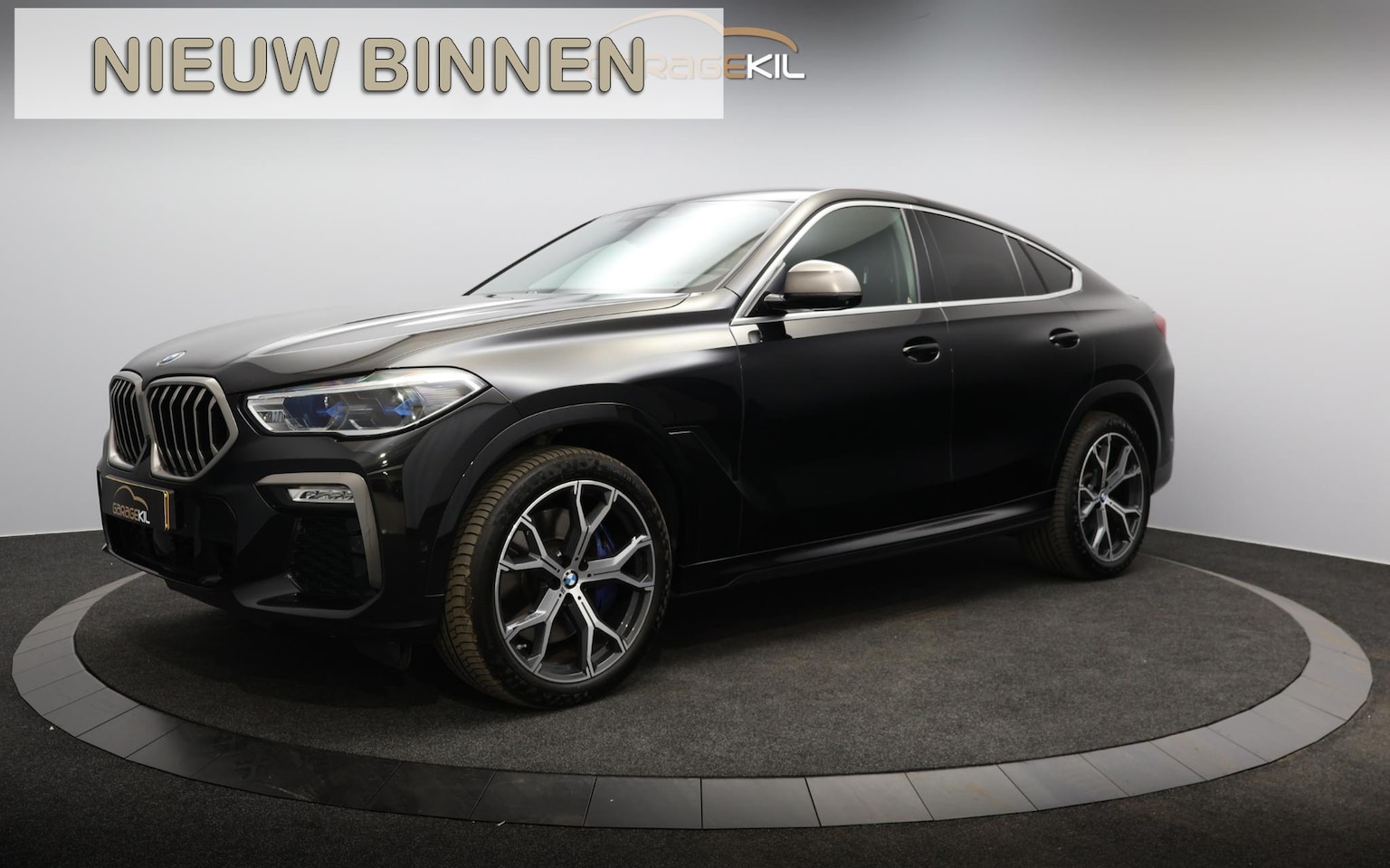 BMW X6 - M50i High Executive Orig. NL / 360 Camera / Leder dash. / Achteras best. / Merino / 21'' L - AutoWereld.nl