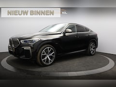 BMW X6 - M50i High Executive Orig. NL / 360 Camera / Leder dash. / Achteras best. / Merino / 21'' L