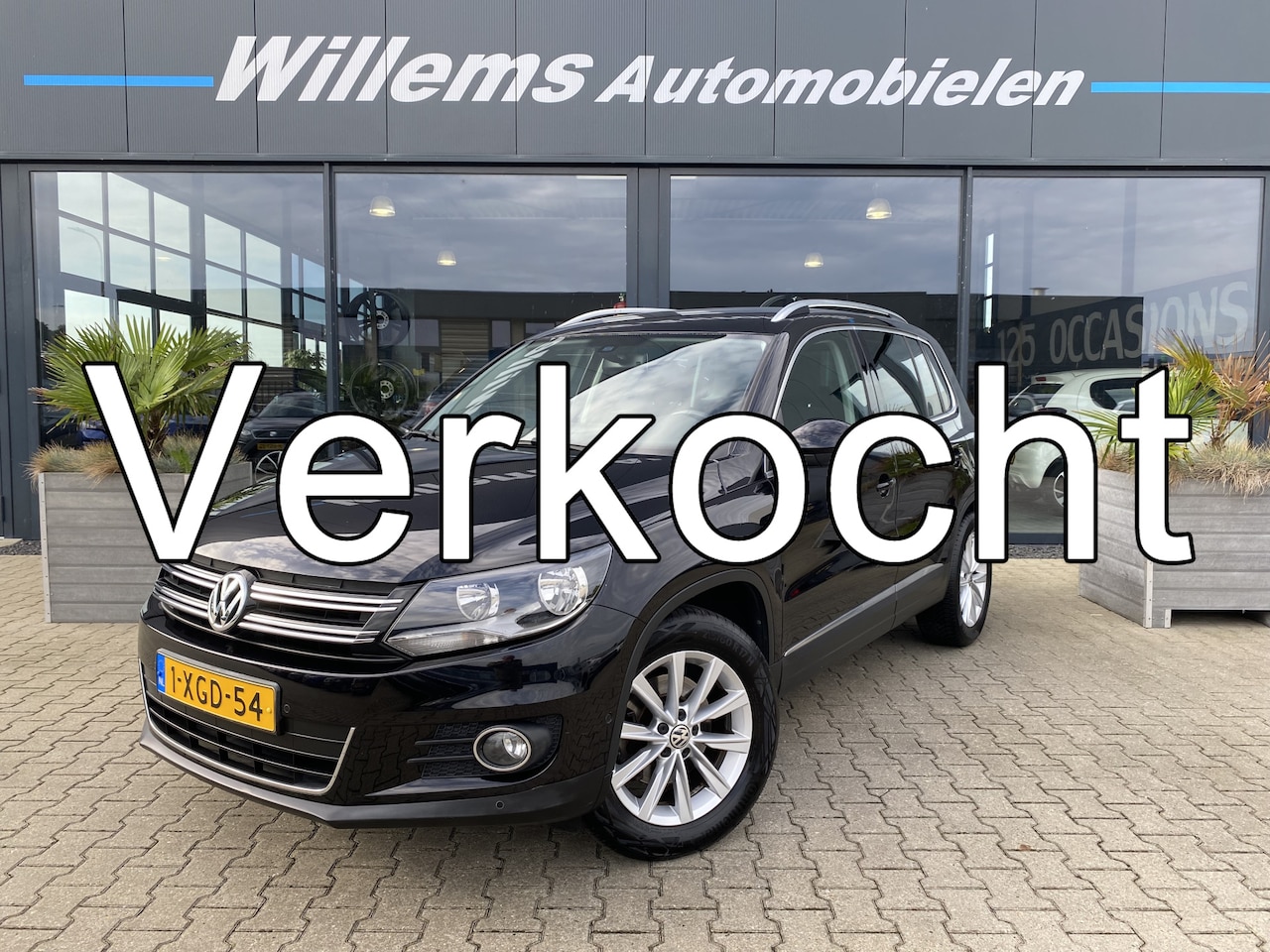 Volkswagen Tiguan - 1.4 TSI Sport&Style Navigatie, Airco & Cruise Control - AutoWereld.nl