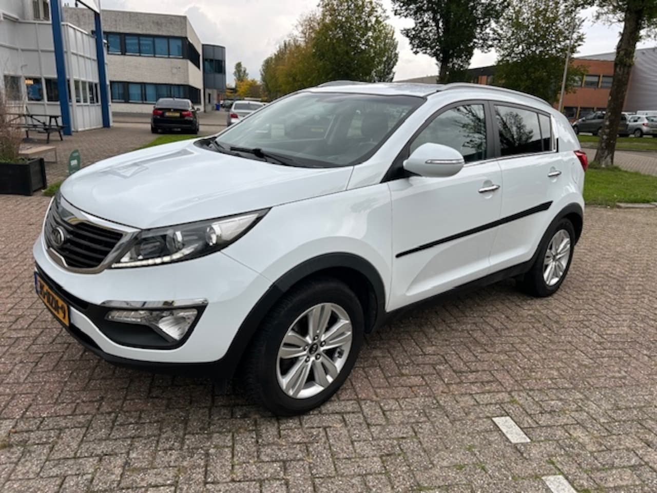 Kia Sportage - 2.0 X-ecutive Plus CLIMA CRUISE TRHK NAP - AutoWereld.nl