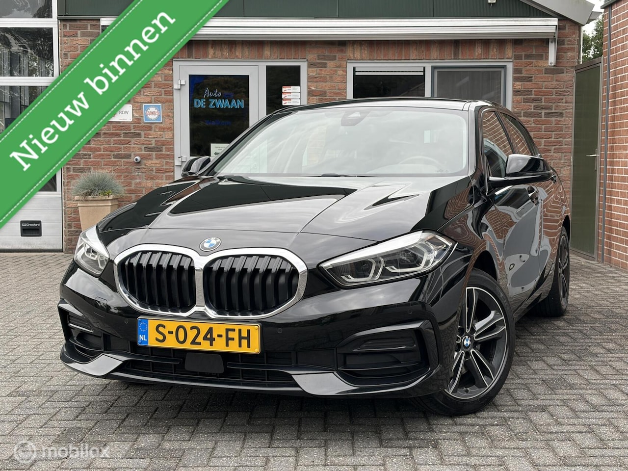 BMW 1-serie - 118i M Sport Business|Leer|Parkeersensor V/A|Camera|Stoelverwarming. - AutoWereld.nl