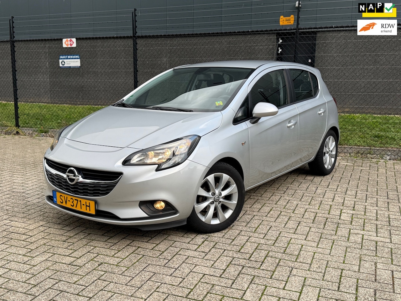 Opel Corsa - 1.4 Favourite |Org.NL| |Navi| |CruiseControl| - AutoWereld.nl