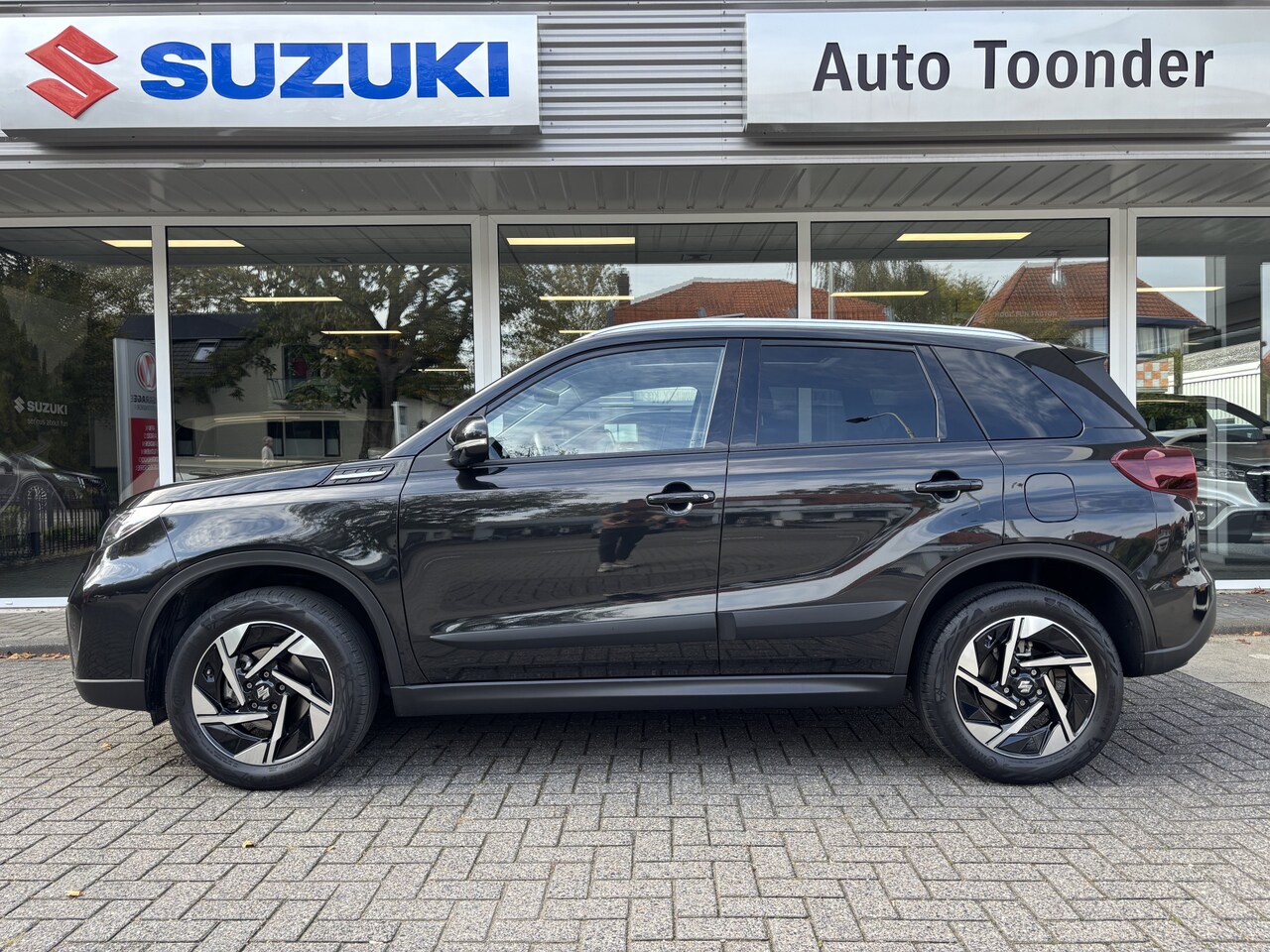 Suzuki Vitara - 1.4 Boosterjet Style Smart Hybrid 1.4 Boosterjet Style Smart Hybrid - AutoWereld.nl