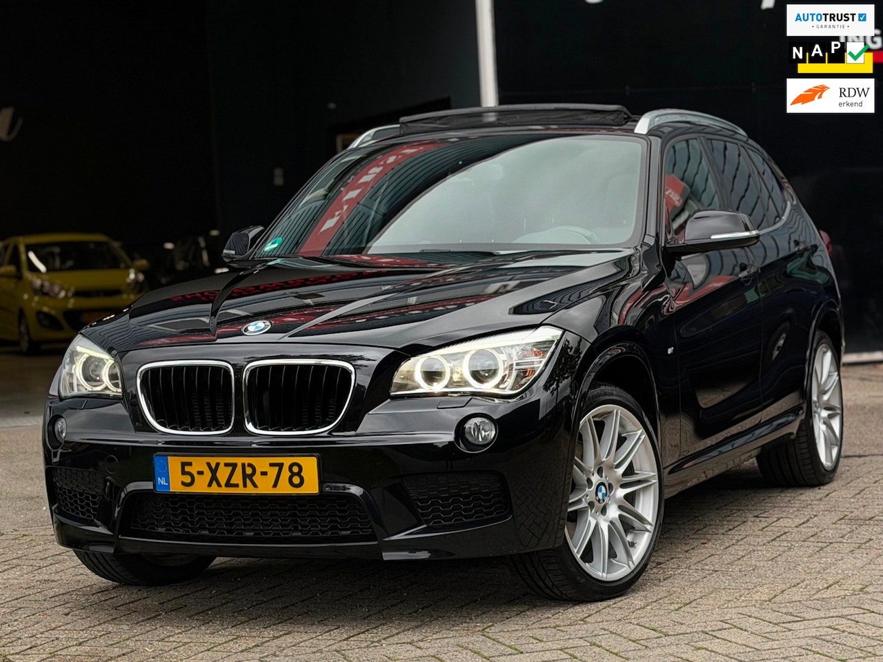 BMW X1 - SDrive20i High Executive AUTOMAAT M-PAKKET/PANO/LEDER/XENON | KEURIGE AUTO ! - AutoWereld.nl