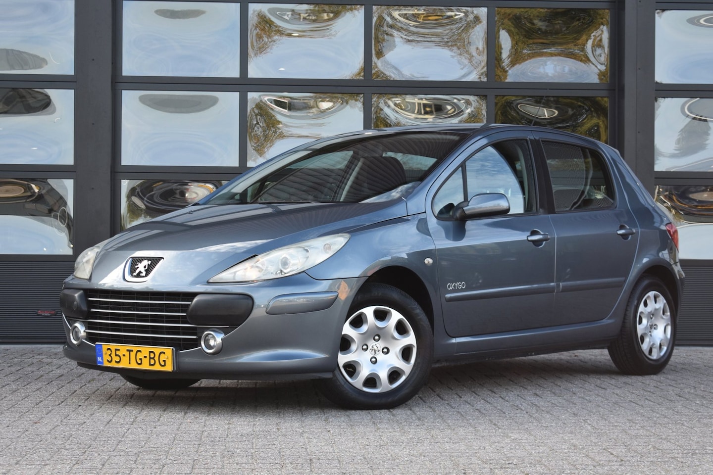 Peugeot 307 - 1.6-16V Oxygo '06 Clima Cruise NL Auto - AutoWereld.nl