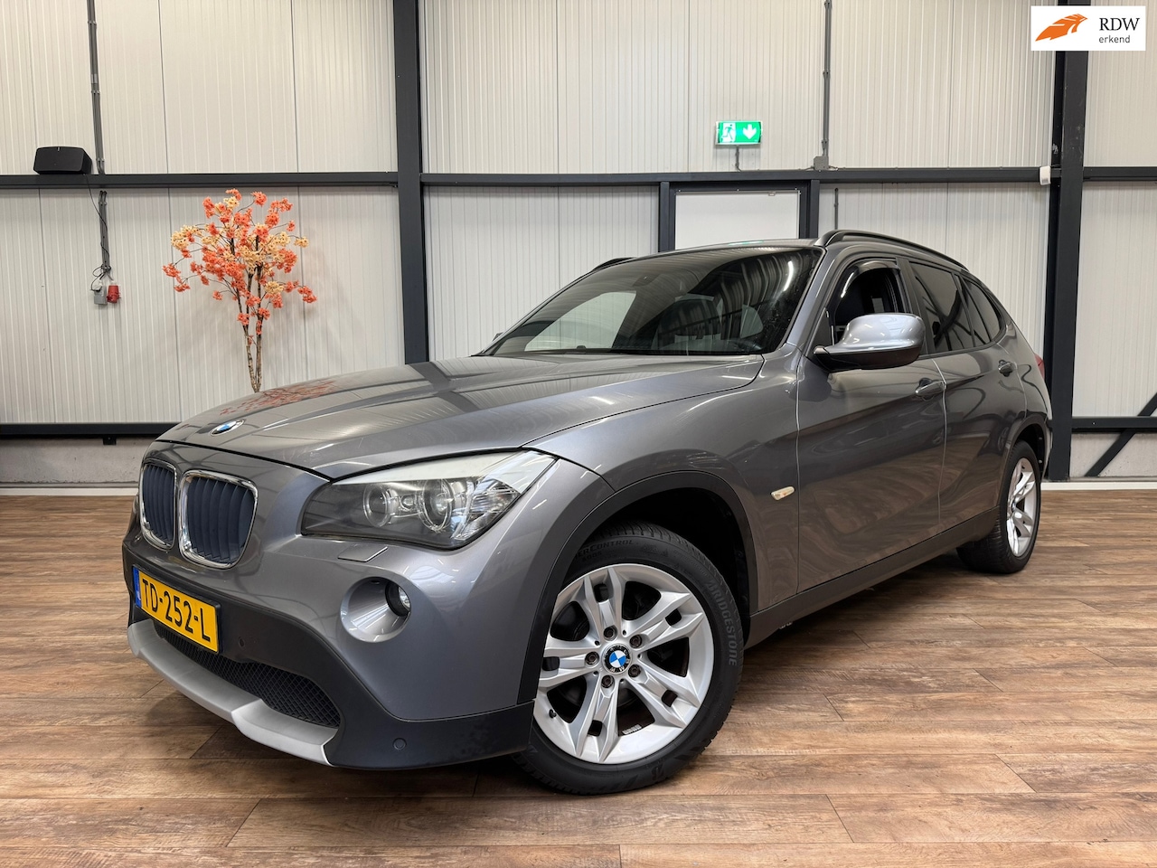 BMW X1 - XDrive20i Business / CLIMA / CRUISE / - AutoWereld.nl