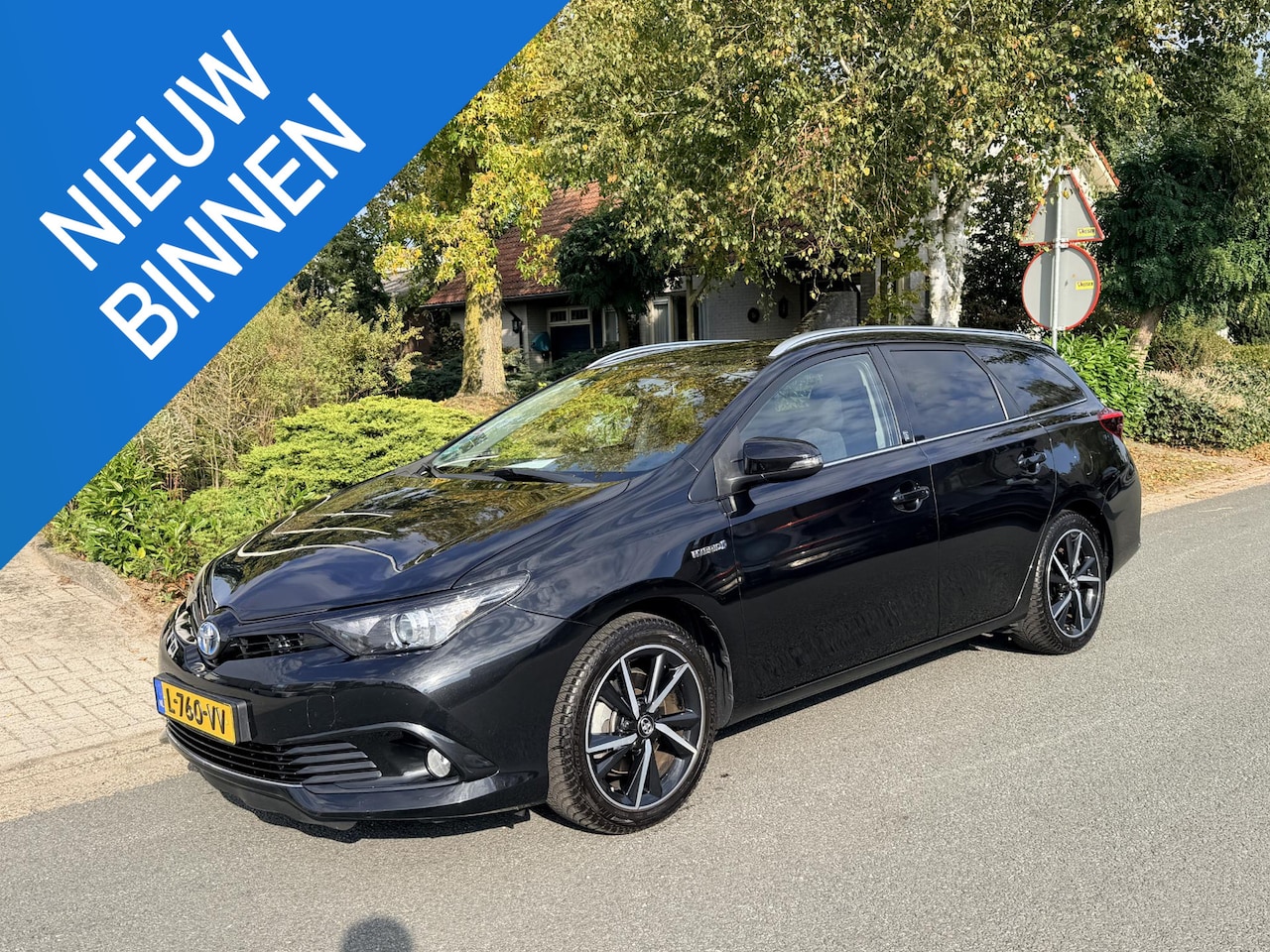 Toyota Auris Touring Sports - 1.8 Hybrid Dynamic 136PK Navi•Trekhaak - AutoWereld.nl