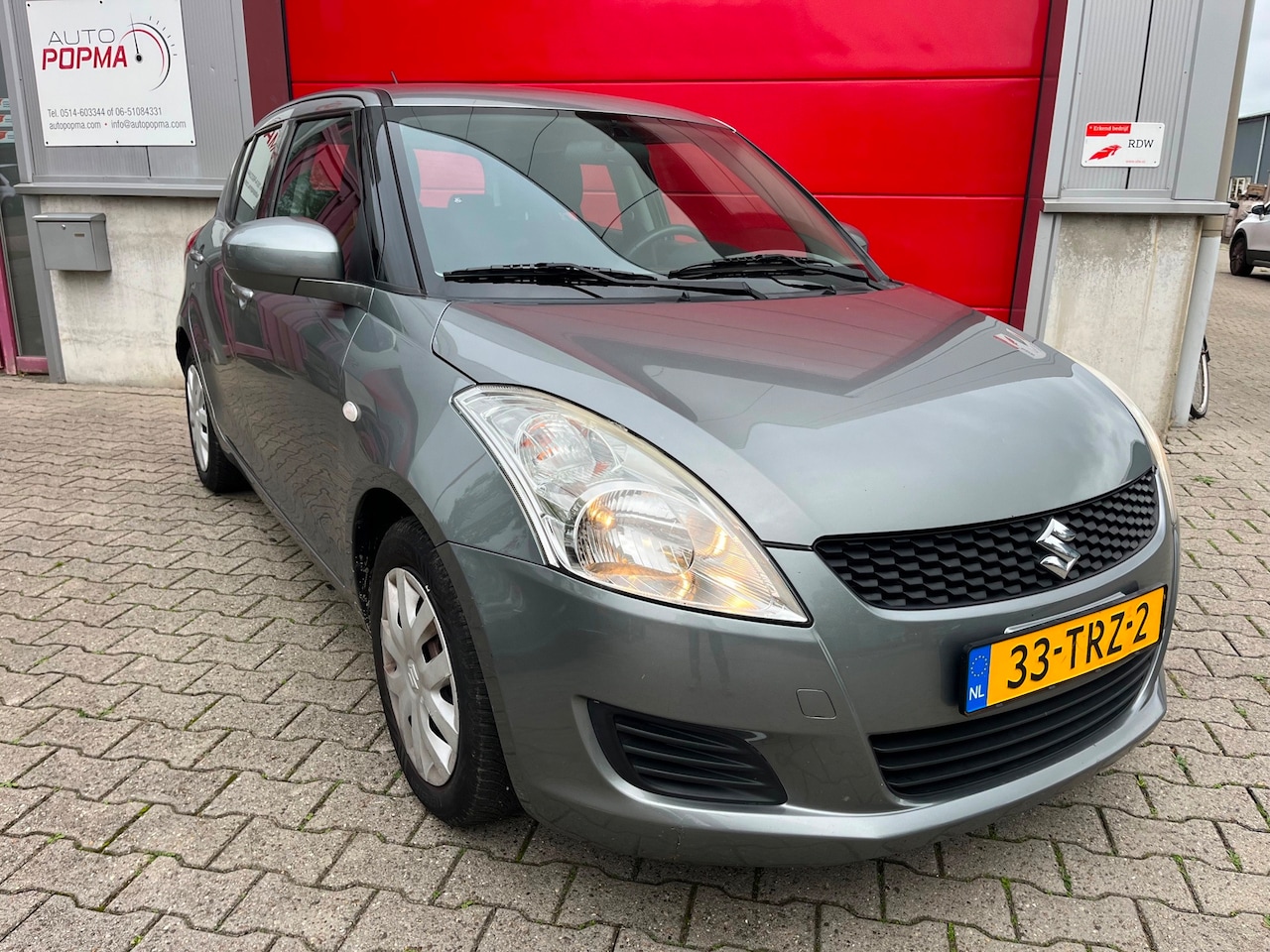 Suzuki Swift - 1.2 94pk Comfort Automaat / Trekhaak / Airconditioning / Stoelverw. voor / Reservewiel / 5 - AutoWereld.nl