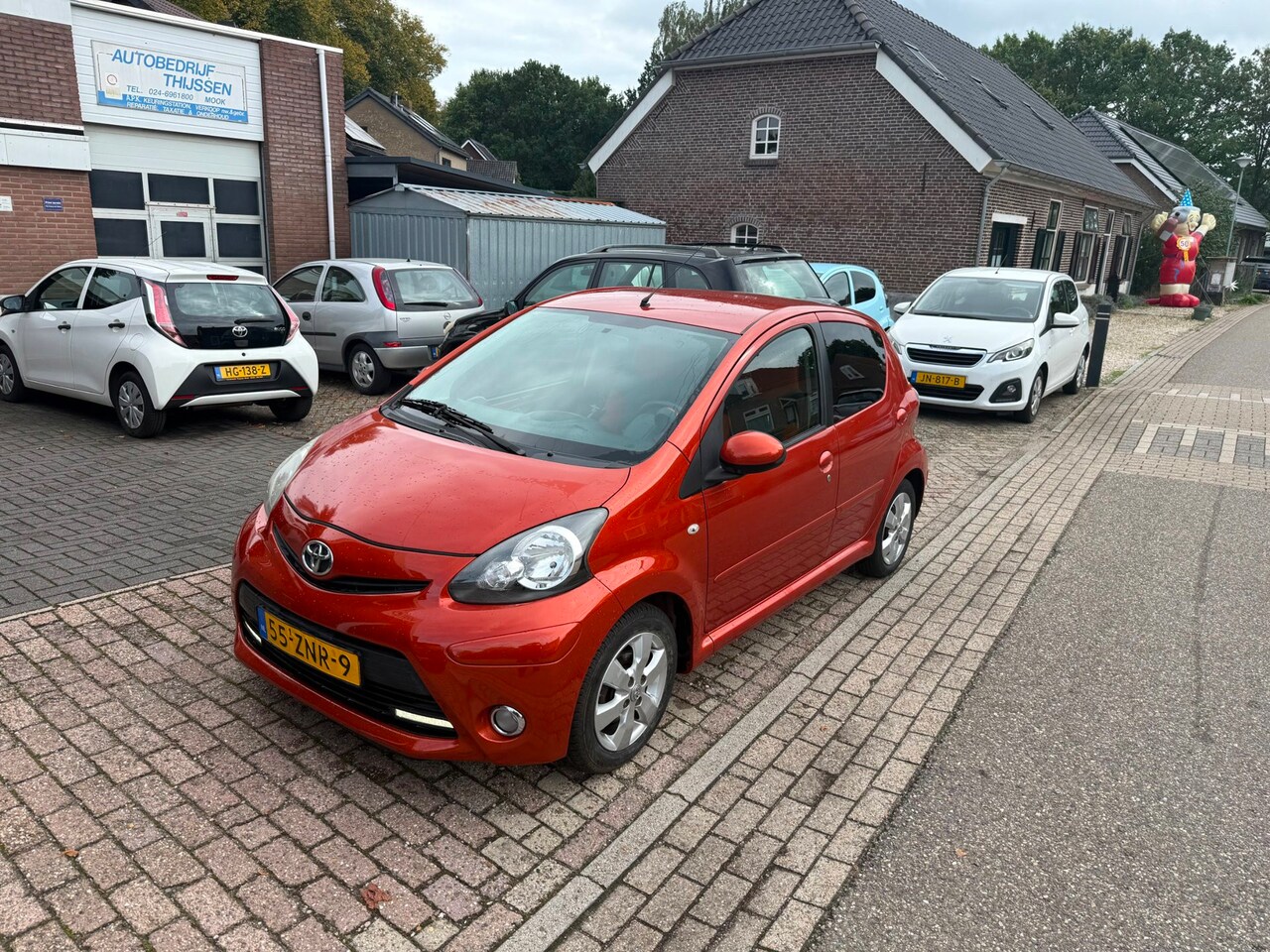 Toyota Aygo - 1.0 VVT-i Dynamic Orange 1.0 VVT-i Dynamic Orange - AutoWereld.nl