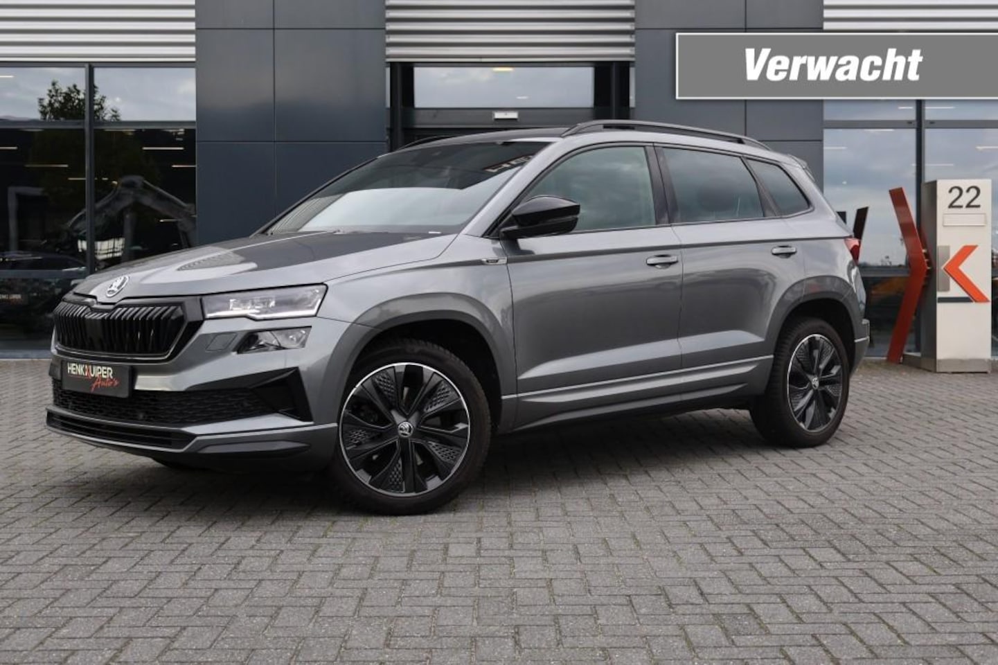 Skoda Karoq - 1.5 TSI ACT Sportline Business / Navi / Camera / ACC / App-Connect/ Matrix LED - AutoWereld.nl