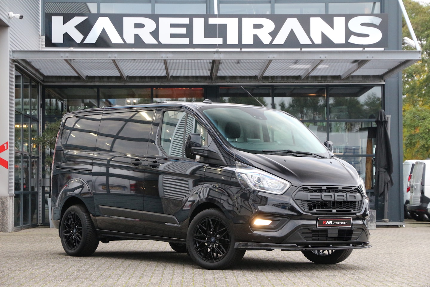 Ford Transit Custom - 2.0 TDCI 130 | 2X Schuifdeur | Trekhaak | Inrichting | Cruise | Airco.. - AutoWereld.nl