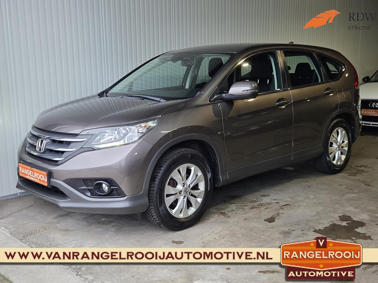 Honda CR-V - 2.0 AWD Elegance 2.0 AWD Elegance, trekhaak (1700kg), clima, cruise, pdc, navi, 17" lmv - AutoWereld.nl