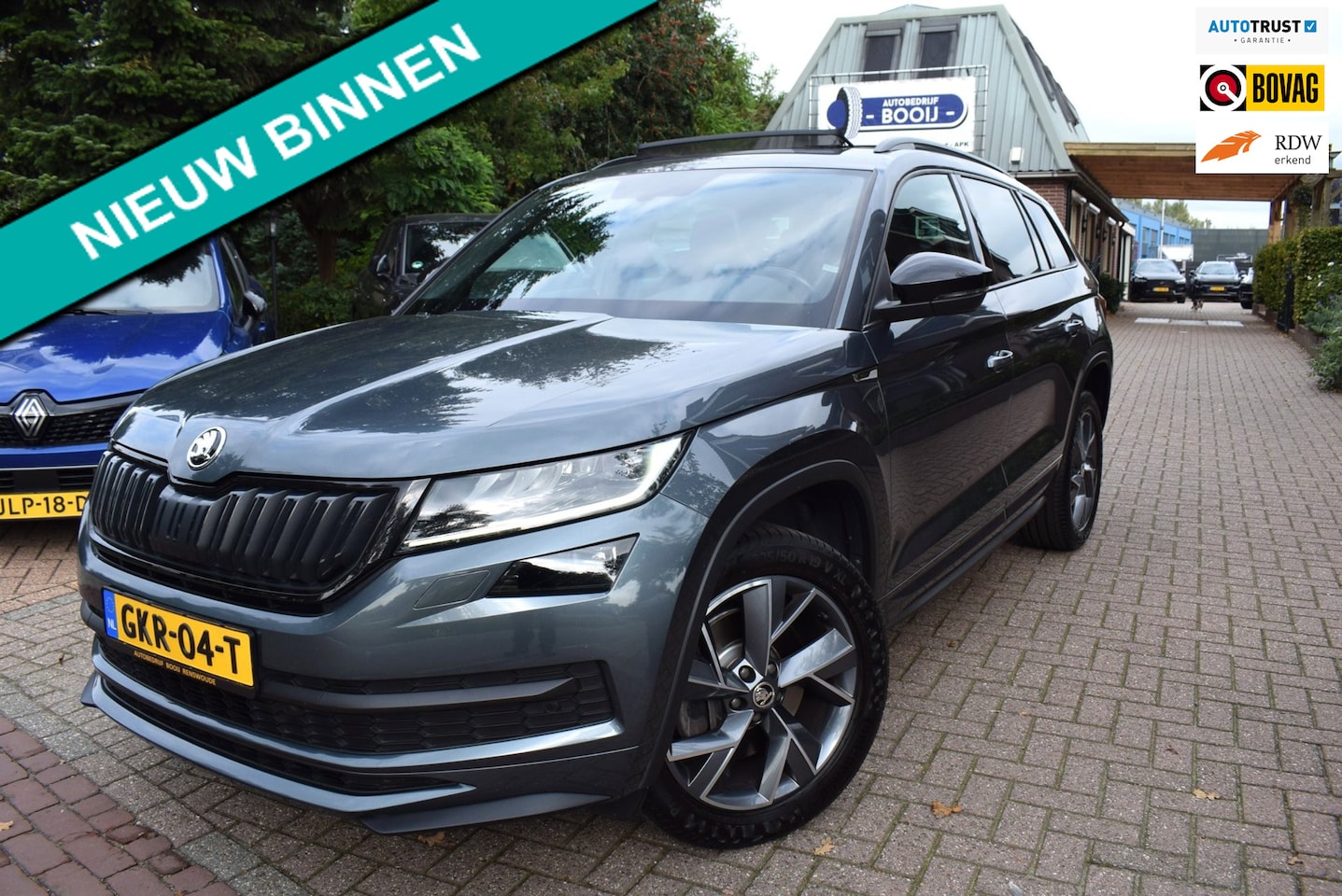 Skoda Kodiaq - 2.0 TSI 4x4 Sportline 7 PERS/PANODAK/CRUISE/CAMERA/TREKHAAK/CARPLAY/MEMORY/KEYLESS/XENON/S - AutoWereld.nl