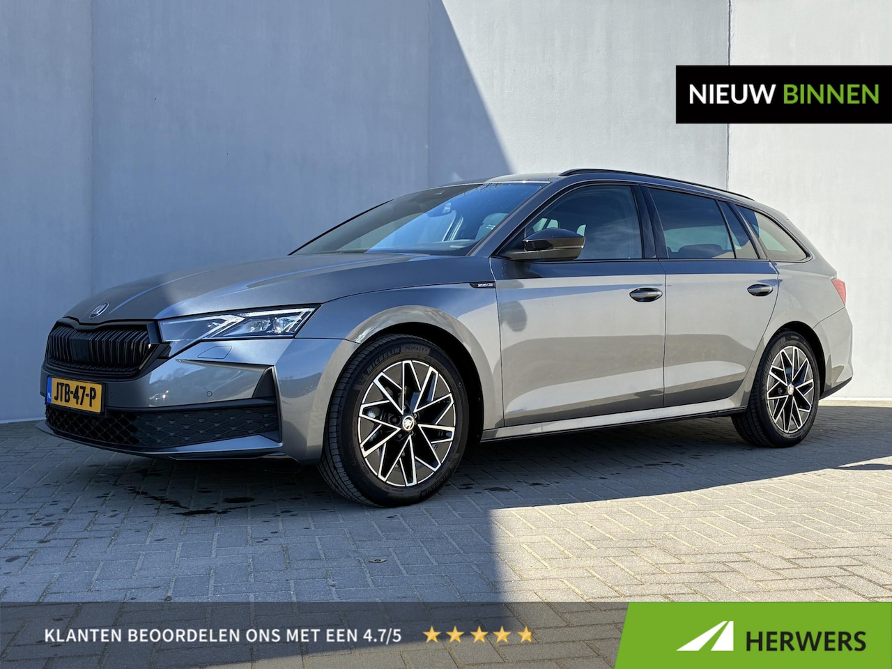 Skoda Octavia Combi - 1.5 TSI MHEV Sportline / Fabrieksgarantie t/m 12-2026 / Adaptieve Cruise Control / Navigat - AutoWereld.nl