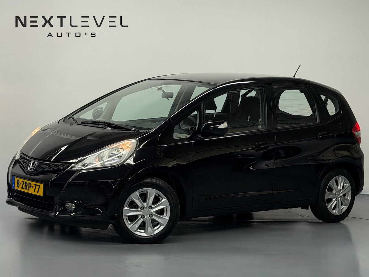 Honda Jazz - 1.4 Comfort Airco Dealeronderhouden APK Nette Auto - AutoWereld.nl