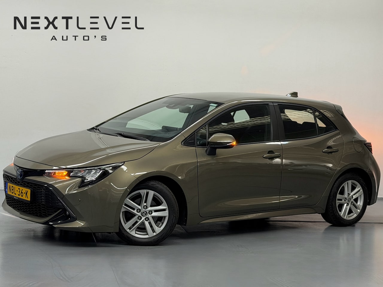 Toyota Corolla - 1.8 Hybrid Active Camera Stoelverwar. Dealeronderhouden LageKM - AutoWereld.nl