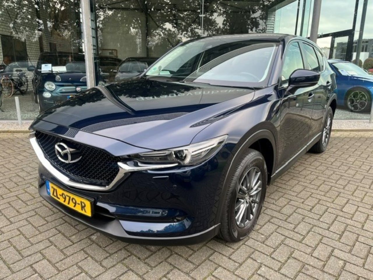 Mazda CX-5 - 2.0 SkyActive-G 165 Business Comfort LEER TREKHAAK - AutoWereld.nl