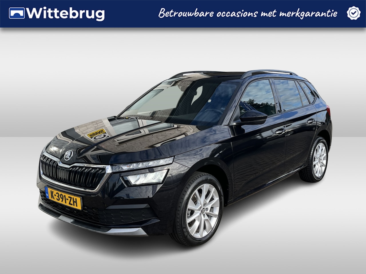 Skoda Kamiq - 1.0 TSI Sport Business / PARK. SENSOREN/ 110 PK/ LED/ SMARTLINK/ CRUISE/ LANE ASSIST/ CLIM - AutoWereld.nl