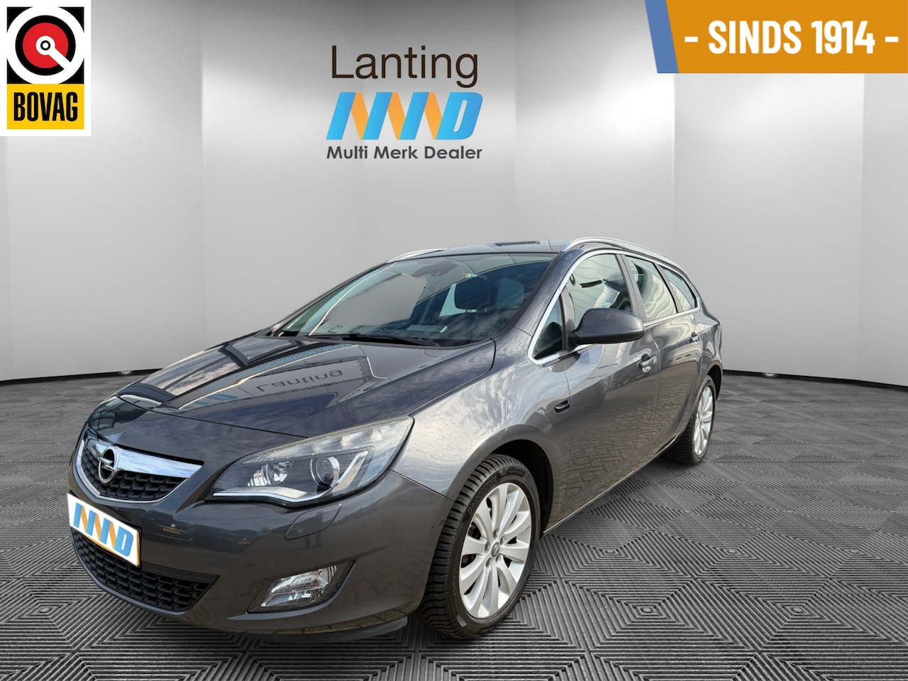 Opel Astra Sports Tourer - 1.4 Turbo Cosmo airco cruise - AutoWereld.nl
