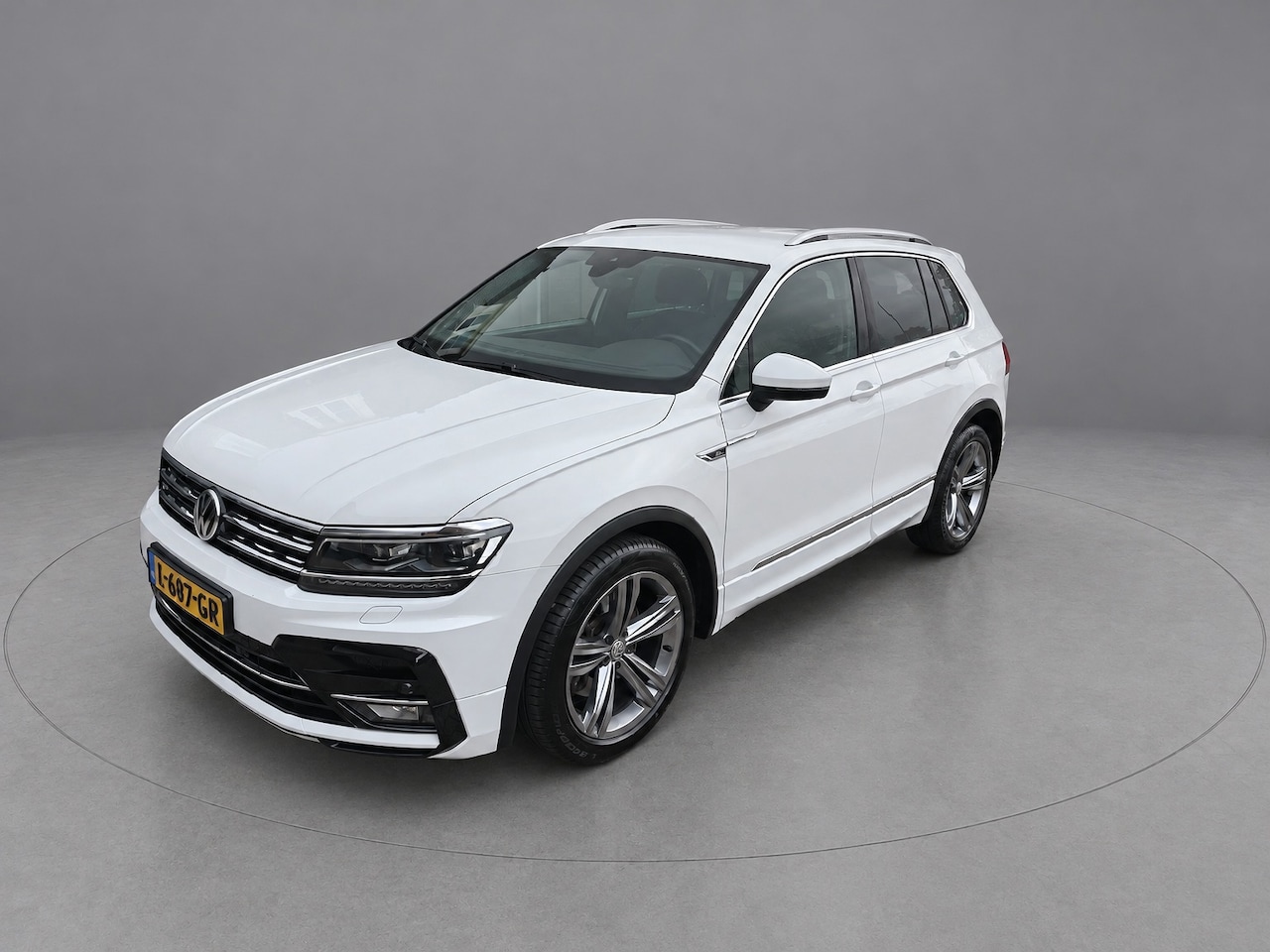 Volkswagen Tiguan - 2.0 TSI 4Motion Highline Business R 2.0 TSI 4Motion Highline Business R, Trekhaak, Led, ACC, Leer, Navi, Bluetooth, NAP - AutoWereld.nl