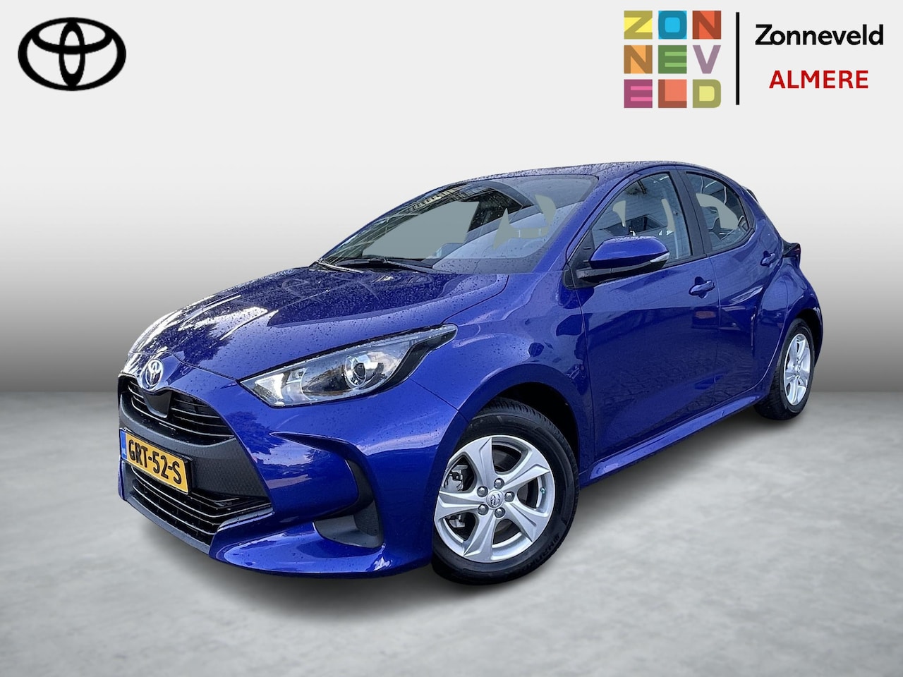 Toyota Yaris - 1.5 Hybrid 115 Comfort Trekhaak all seasonbanden - AutoWereld.nl