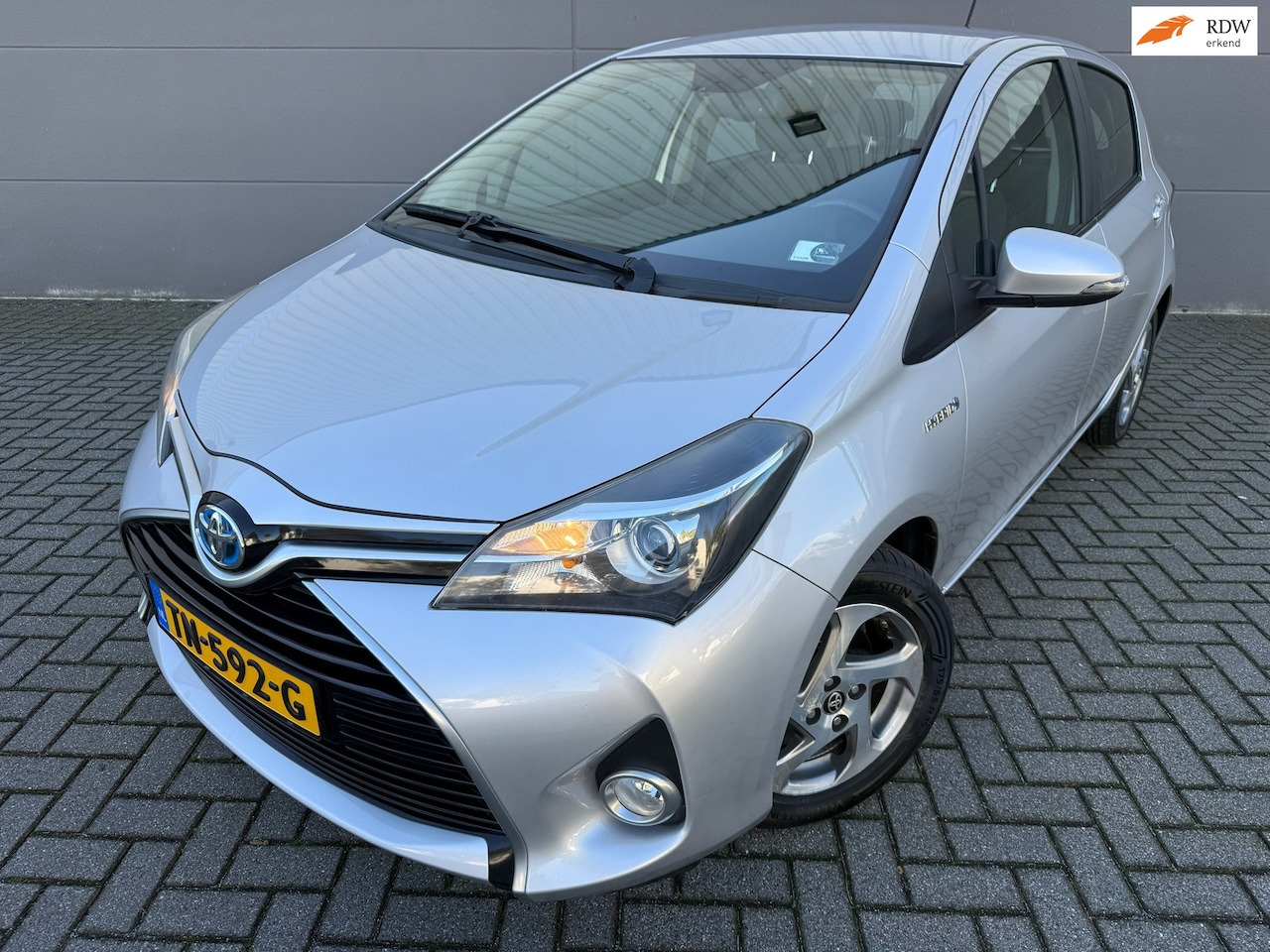 Toyota Yaris - 1.5 Hybrid Lease*Camera*NAVI*Cruise*AUT*Climat-Airco*Velgen*APK - AutoWereld.nl