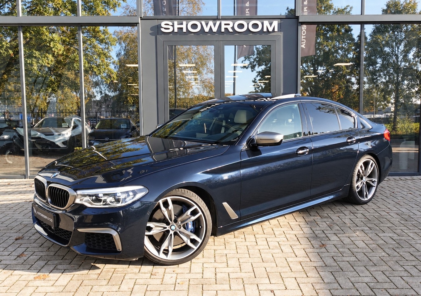 BMW 5-serie - M550i xDrive PANO HUD HARMAN VOL - AutoWereld.nl