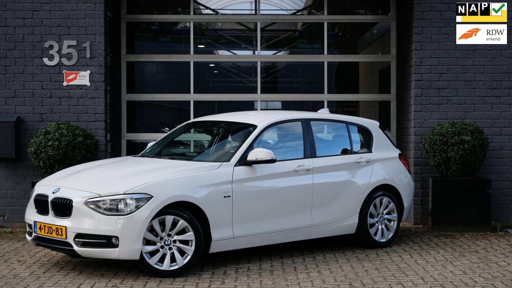 BMW 1-serie - 116i High Executive Cruise|Navi|Leder|Xenon - AutoWereld.nl