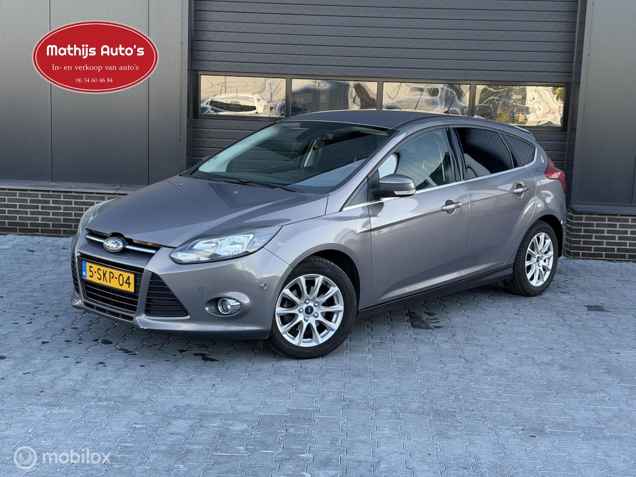 Ford Focus - 1.6 TDCI Titanium Clima PDC Navi - AutoWereld.nl