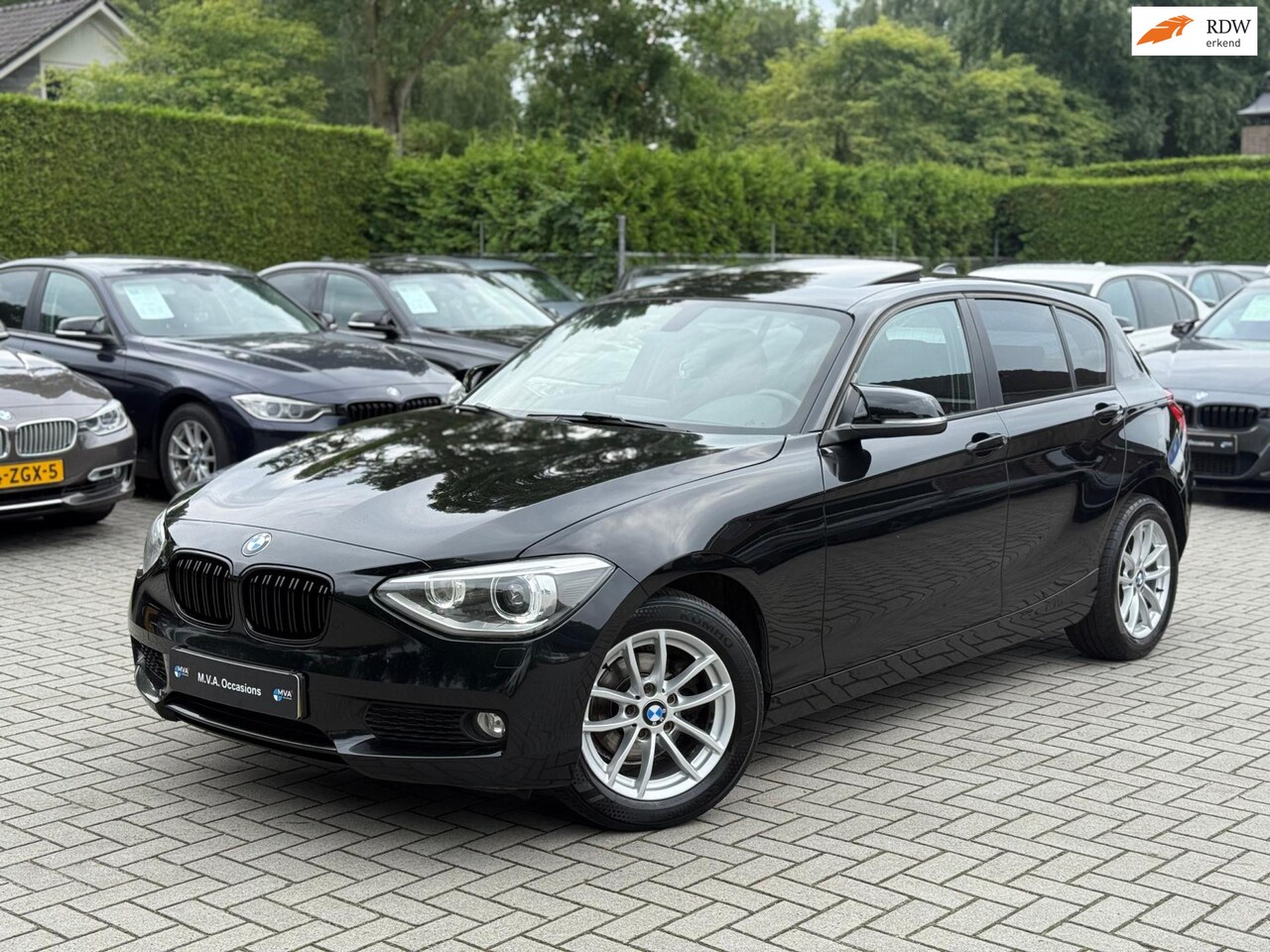 BMW 1-serie - 116i High Executive|Nieuwe Ketting + Klepseals|Xenon|Groot navigatie|Dakje|Climate control - AutoWereld.nl