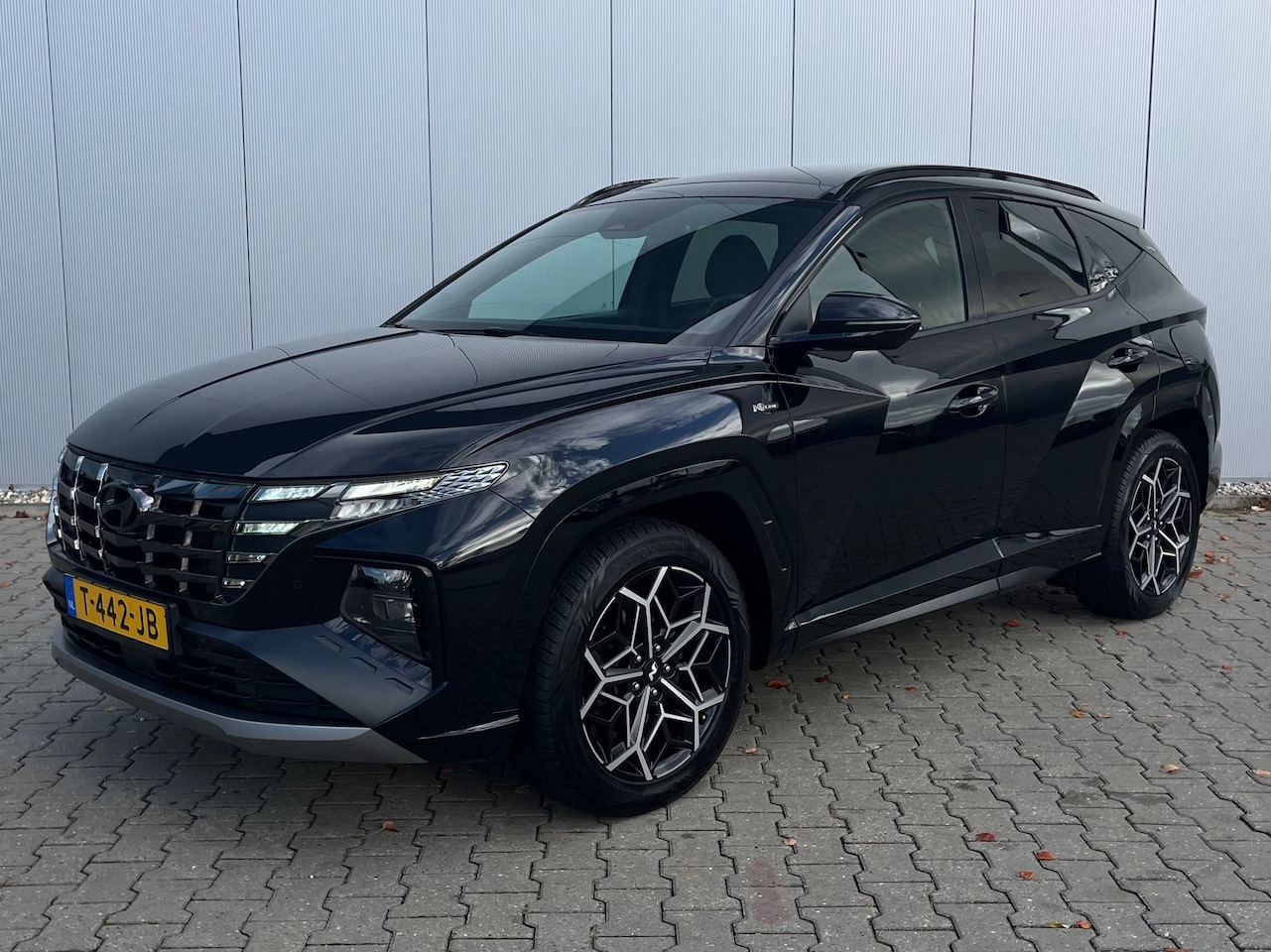 Hyundai Tucson - 1.6 T-GDI HEV Premium Sky | Trekhaak | All-season banden | Elektrisch glazen panorama-dak - AutoWereld.nl