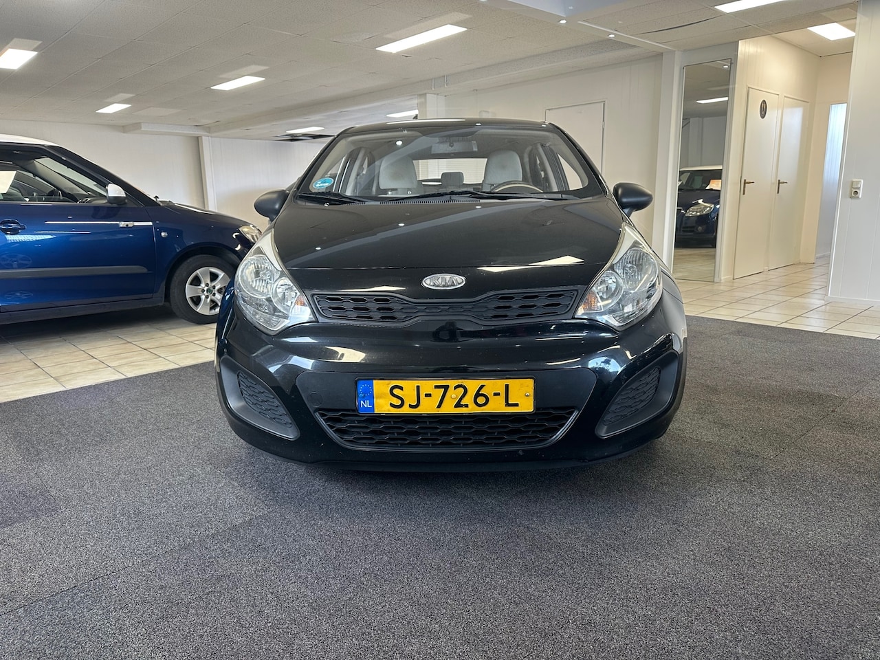 Kia Rio - 1.2 CVVT Comfort Pack 1.2 CVVT Comfort Pack - AutoWereld.nl