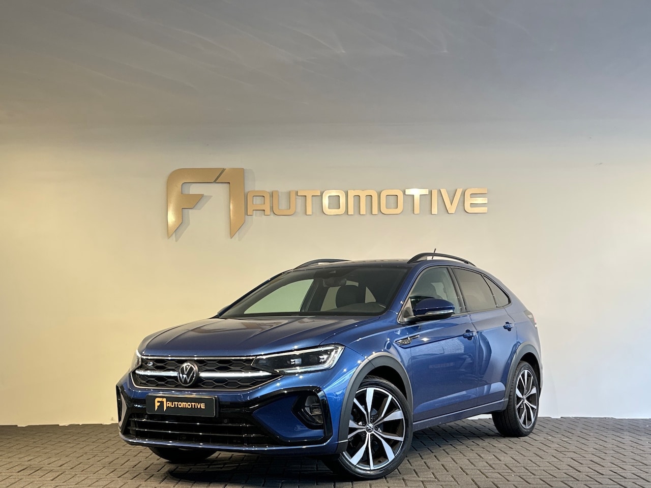 Volkswagen Taigo - 1.0 TSI R-Line Keyless|Camera|ACC|Stoelverwarming - AutoWereld.nl