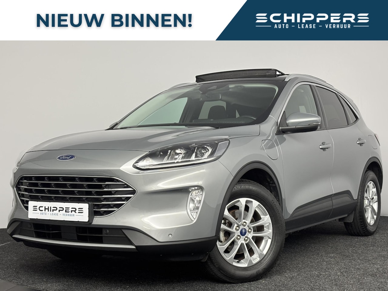 Ford Kuga - 2.5 PHEV Titanium | Glazen dak | Trekhaak - AutoWereld.nl