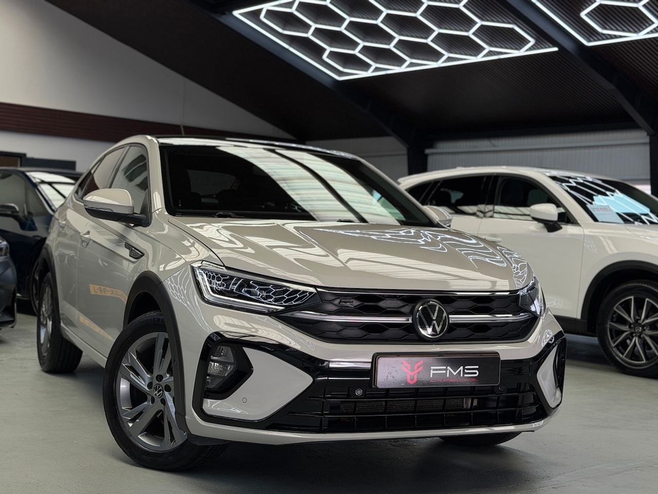 Volkswagen Taigo - 1.0 TSI 2x R-Line Panorama CarPlay Camera - AutoWereld.nl