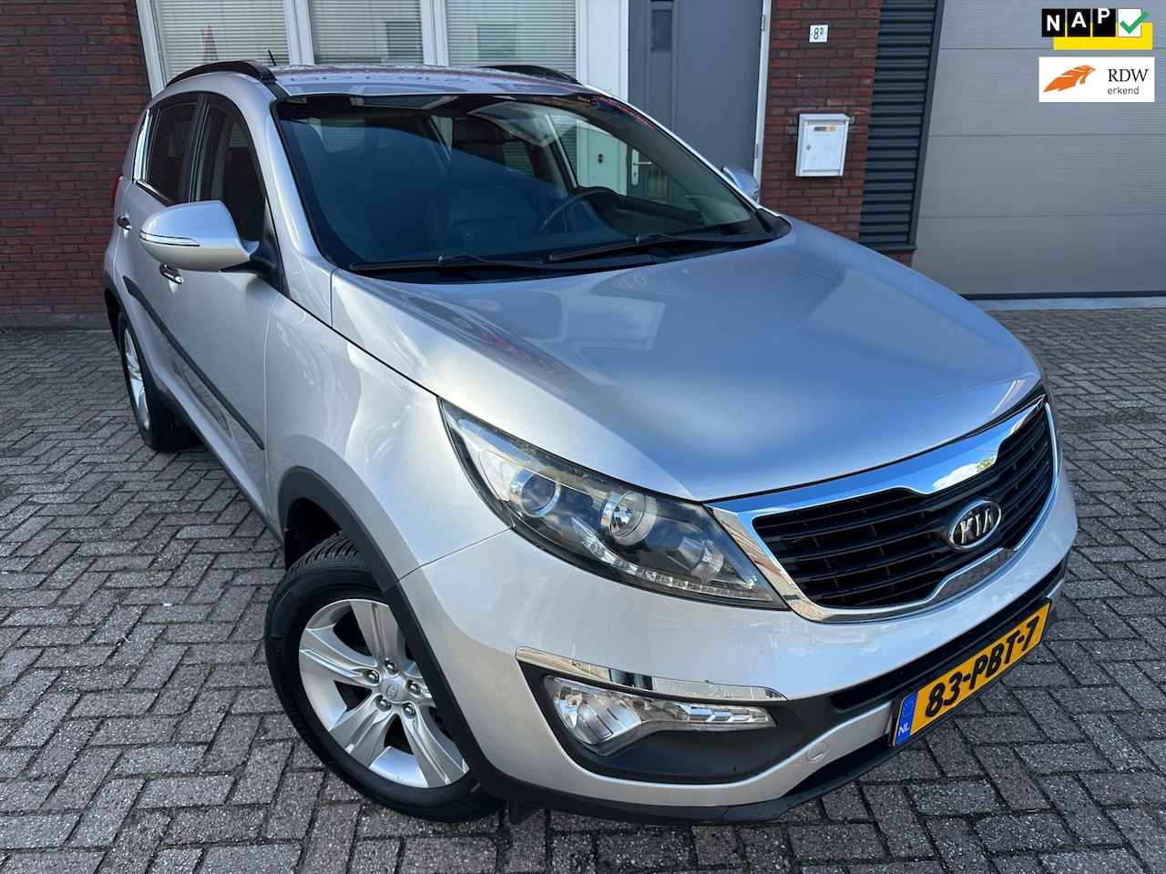 Kia Sportage - 2.0 X-ecutive Plus Pack / Leder / Navi / PDC / Clima / Cruise - AutoWereld.nl