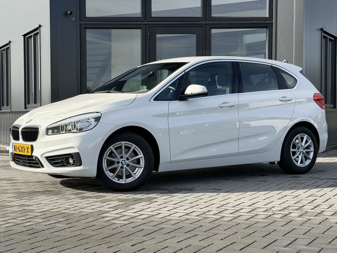 BMW 2-serie Active Tourer - 218i Centennial High Executive Leer | Navi Pro | Trekhaak | Dealeroh - AutoWereld.nl