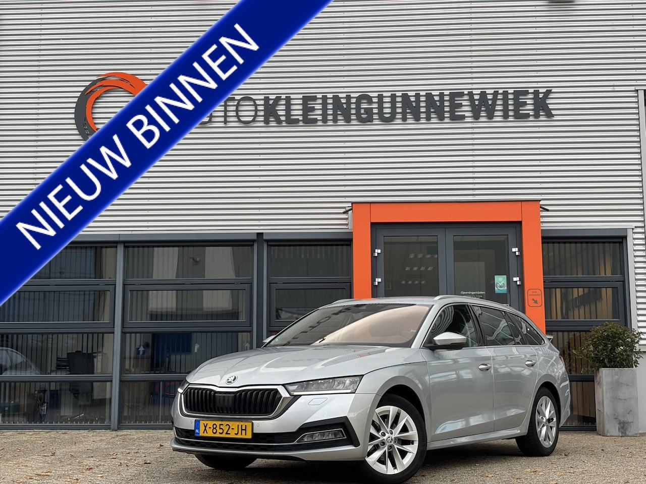 Skoda Octavia Combi - 1.0 e-TSI Business Edition Plus / Trekhaak / Stoelverwarming / Elektrische Achterklep / - AutoWereld.nl
