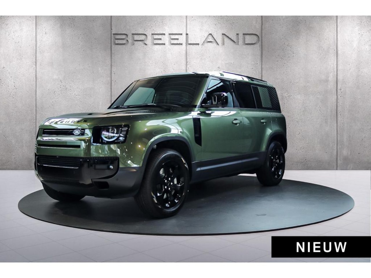 Land Rover Defender 110 - P300e Forest Edition | Panoramadak | Cold Climate | Trekhaak | Sfeerverlichting - AutoWereld.nl