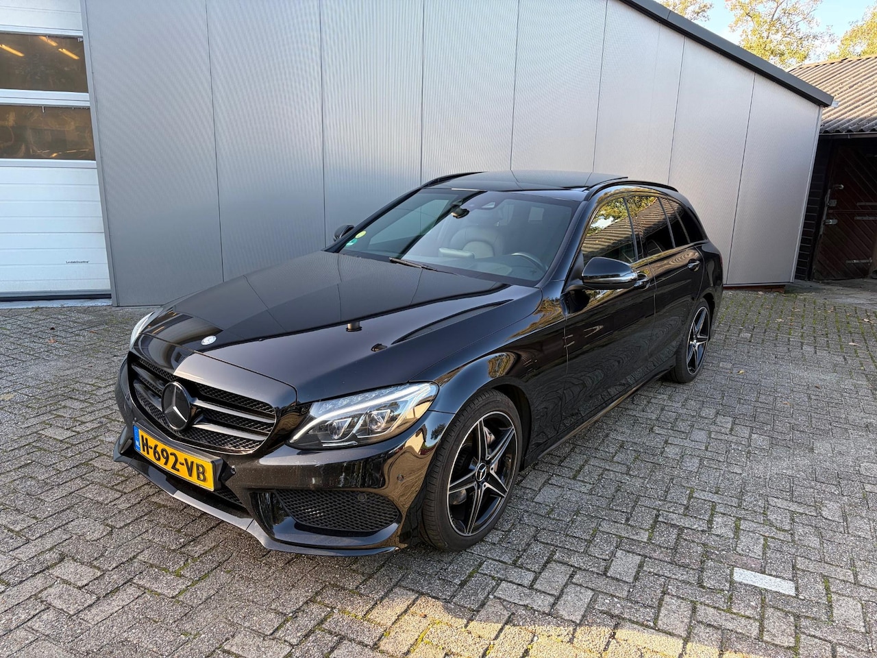 Mercedes-Benz C-klasse Estate - 220 CDI AMG | Panoramadak | LED | Command | Trekhaak - AutoWereld.nl