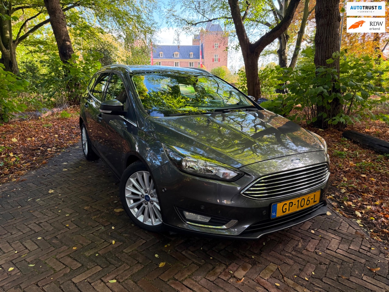 Ford Focus Wagon - 1.0 Titanium Edition | park sensor | trekhaak | stoel verwarming | org NL - AutoWereld.nl