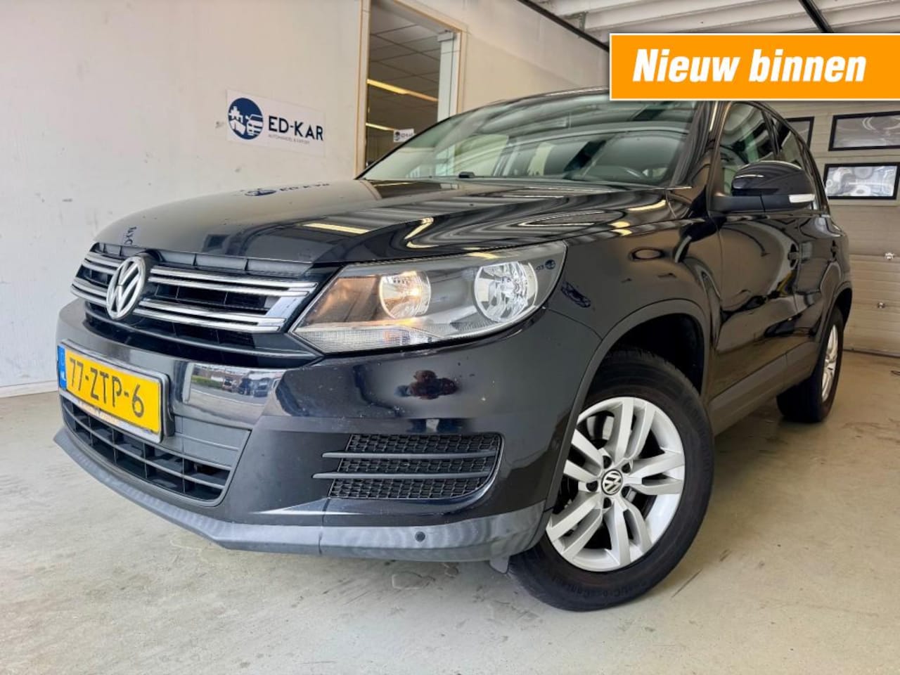 Volkswagen Tiguan - 1.4 TSI ComfortenDesign CLIMA TREKHAAK PARKASS. NAP APK - AutoWereld.nl