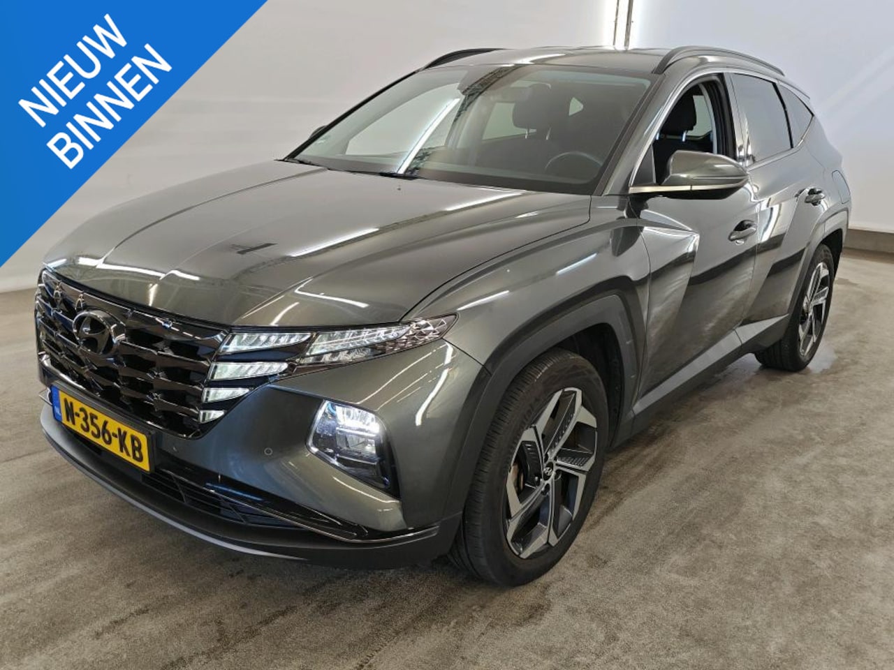 Hyundai Tucson - 1.6 T-GDI PHEV COMFORT SMART 4WD (93% SOH) I AUTOMAAT I TREKHAAK I P-CAMERA I CLIMATE CONT - AutoWereld.nl