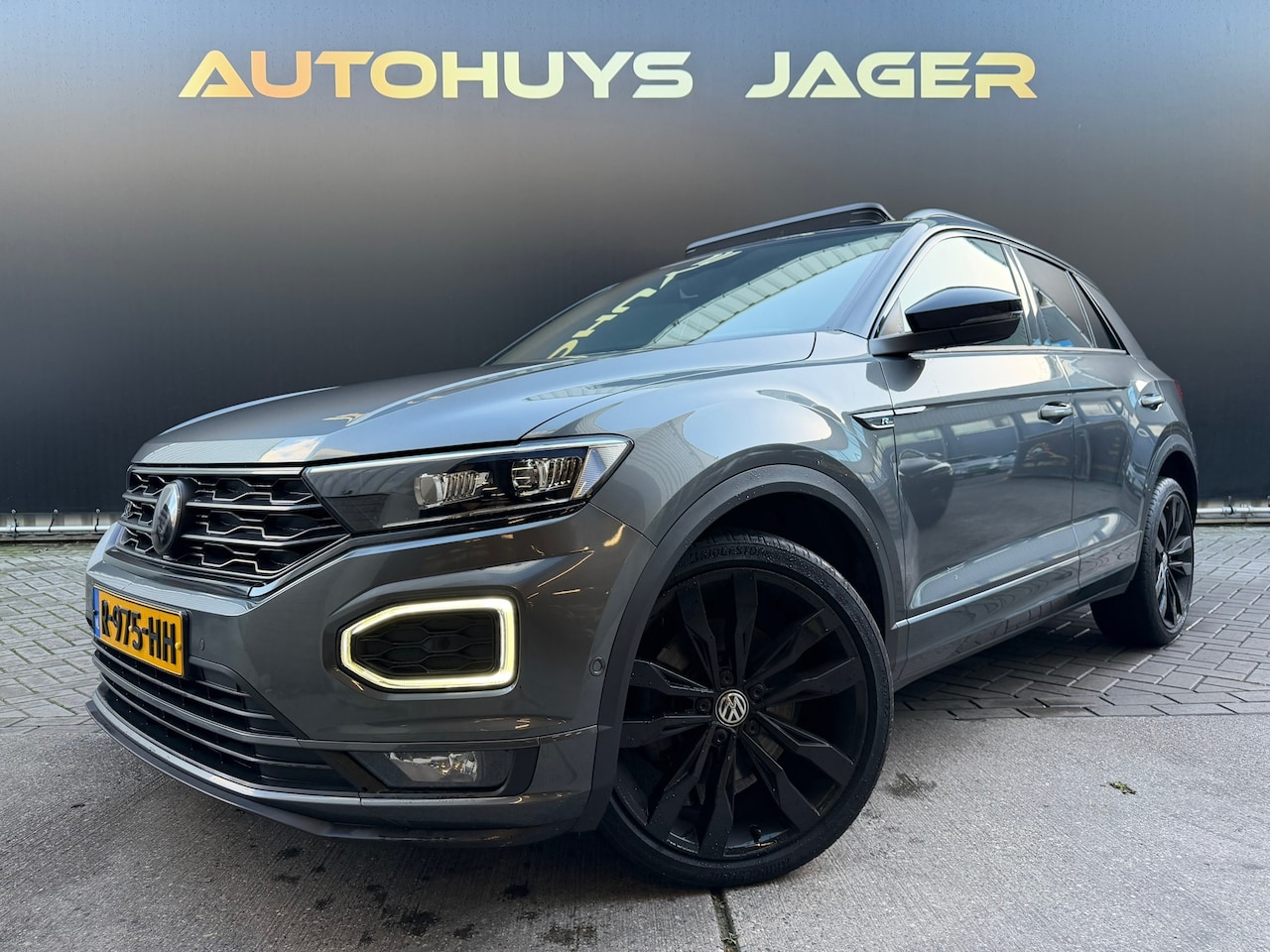 Volkswagen T-Roc - 1.5 TSI Sport Business R Beats Pano Acc Carplay Camera Keyless - AutoWereld.nl